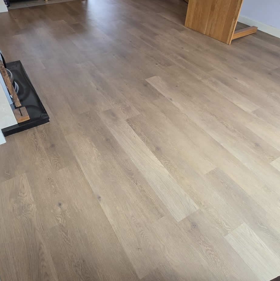 The pattern comes together as the final tiles are laid